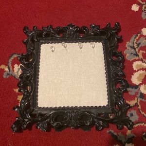 Black frame w/decorative pins